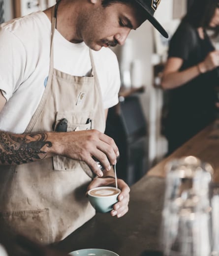 Barista making coffee